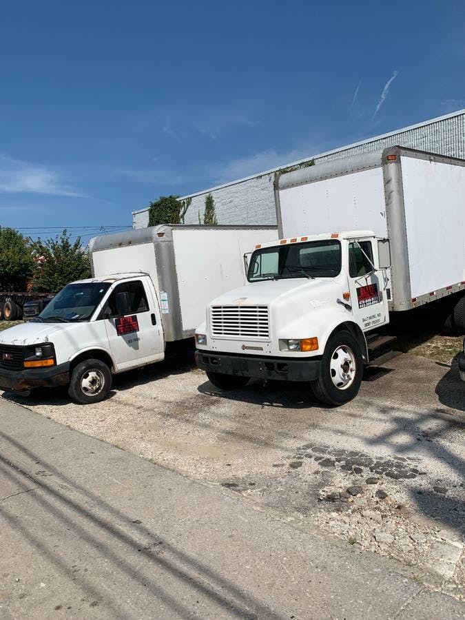 picture of white moving box trucks